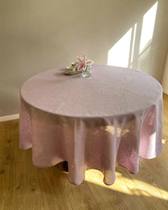 Round tablecloth from soft linen in lilac